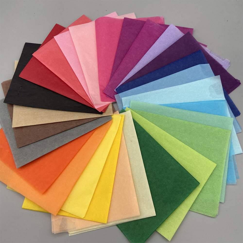 17gsm colored tissue paper in multiple shades, ideal for eco-friendly packaging and product wrapping.